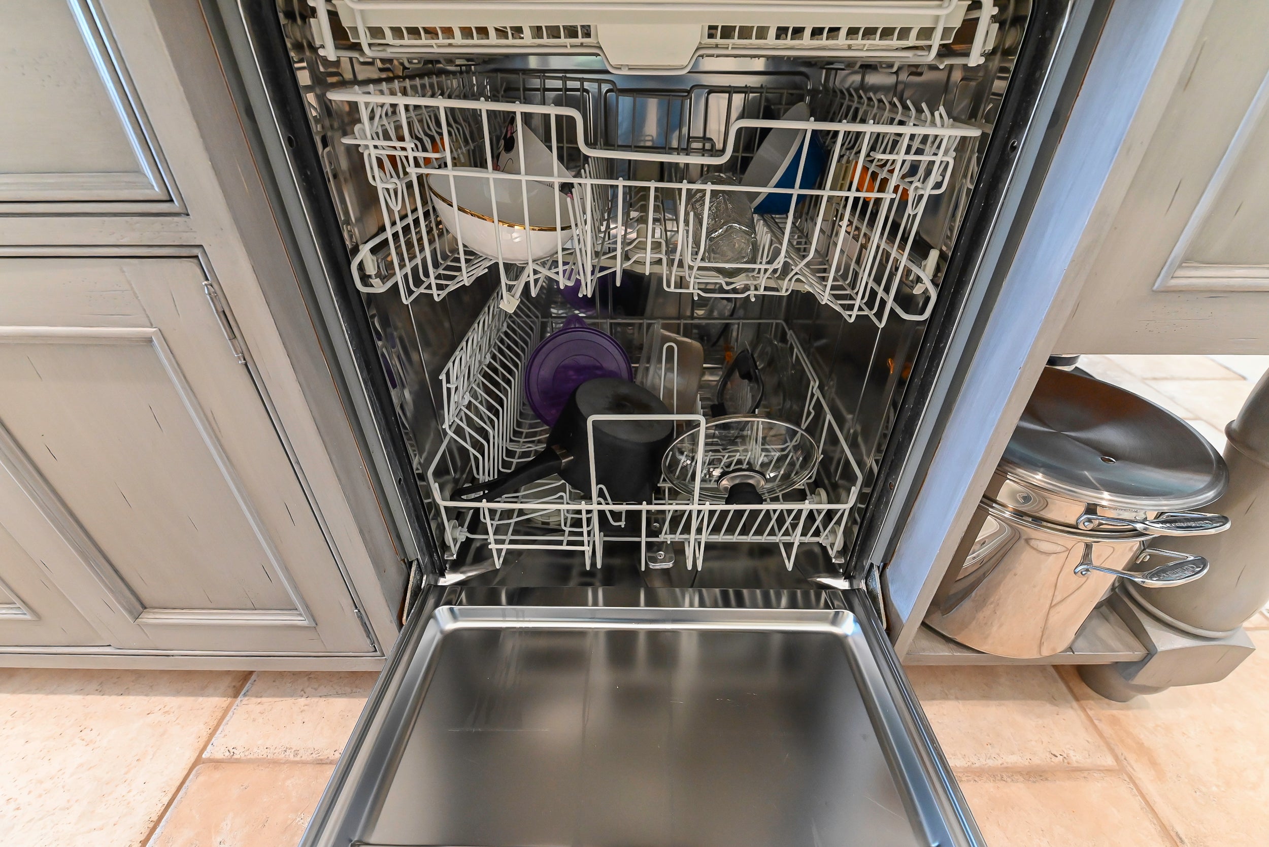 Craftmaid Traditional Off White Kitchen with Island, Granite Countertops & 48" Sub-Zero Refrigerator