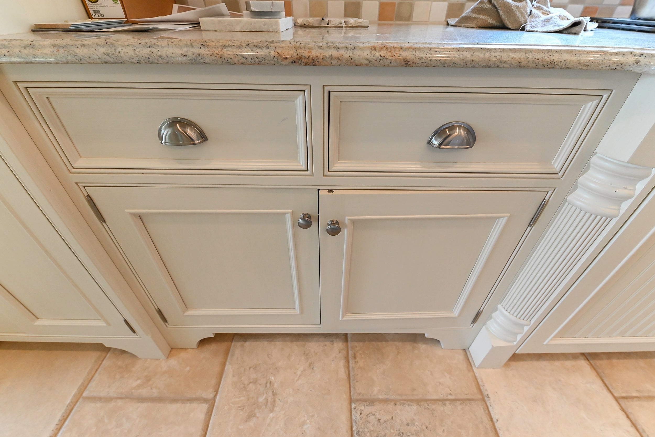 Craftmaid Traditional Off White Kitchen with Island, Granite Countertops & 48" Sub-Zero Refrigerator