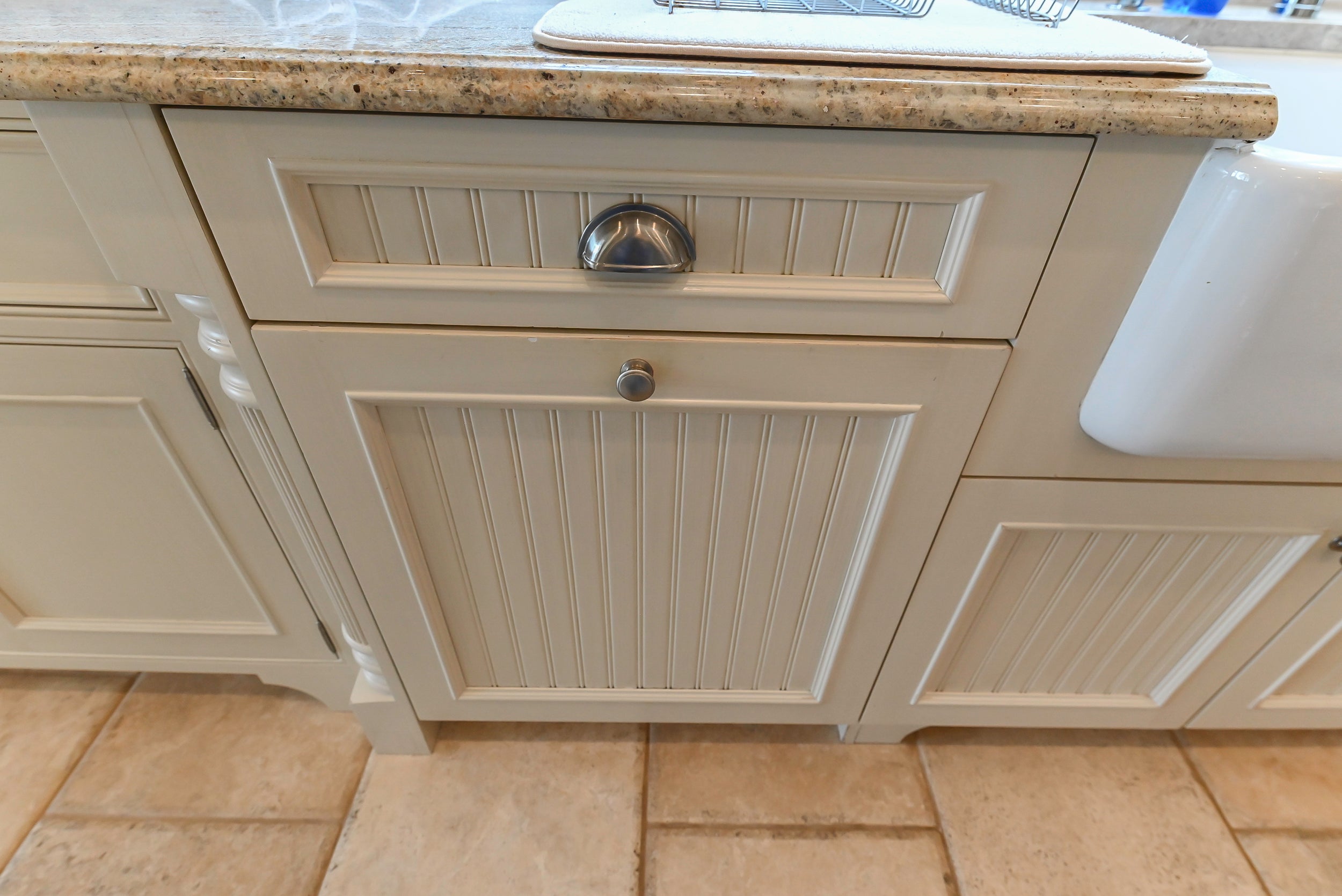 Craftmaid Traditional Off White Kitchen with Island, Granite Countertops & 48" Sub-Zero Refrigerator