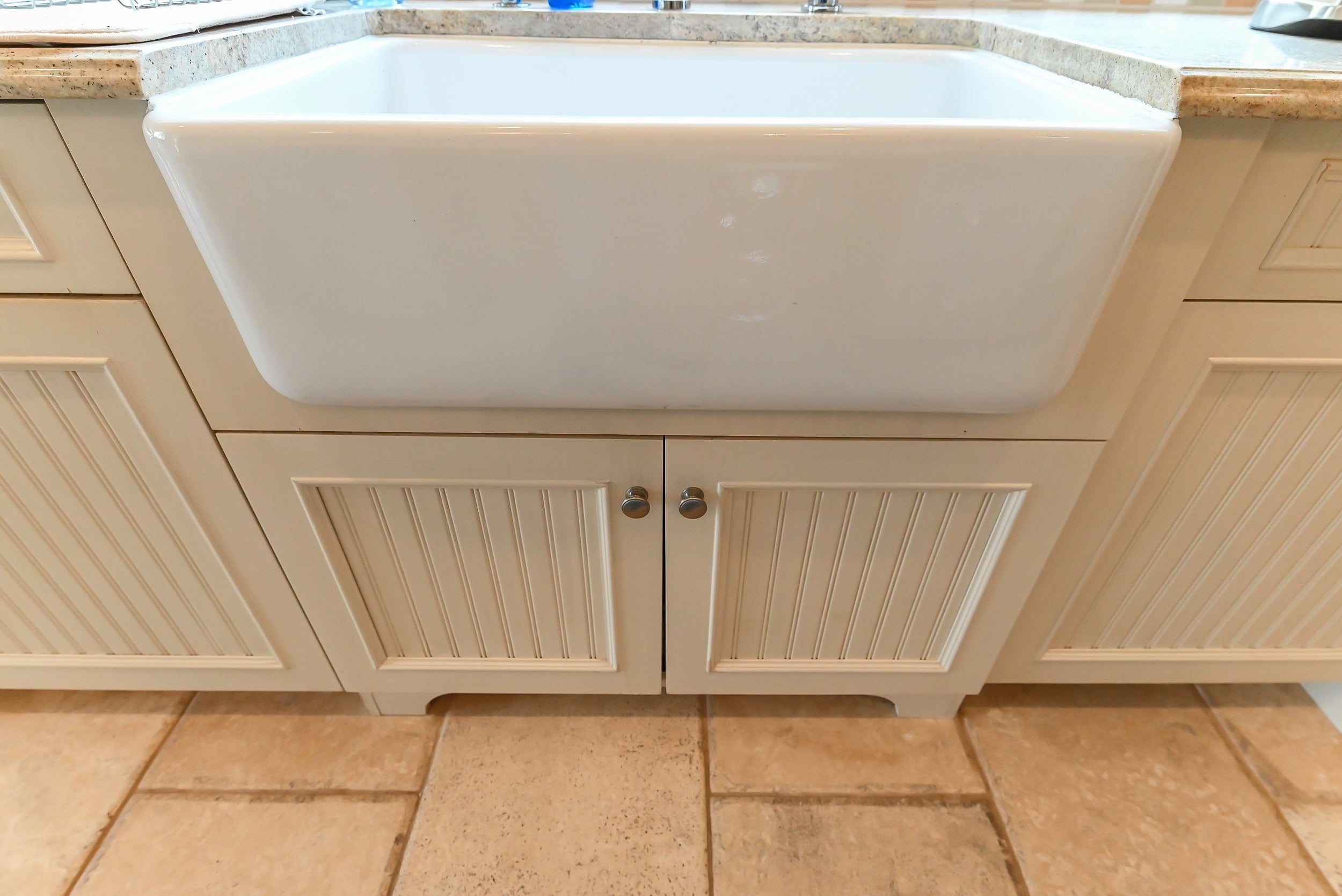 Craftmaid Traditional Off White Kitchen with Island, Granite Countertops & 48" Sub-Zero Refrigerator