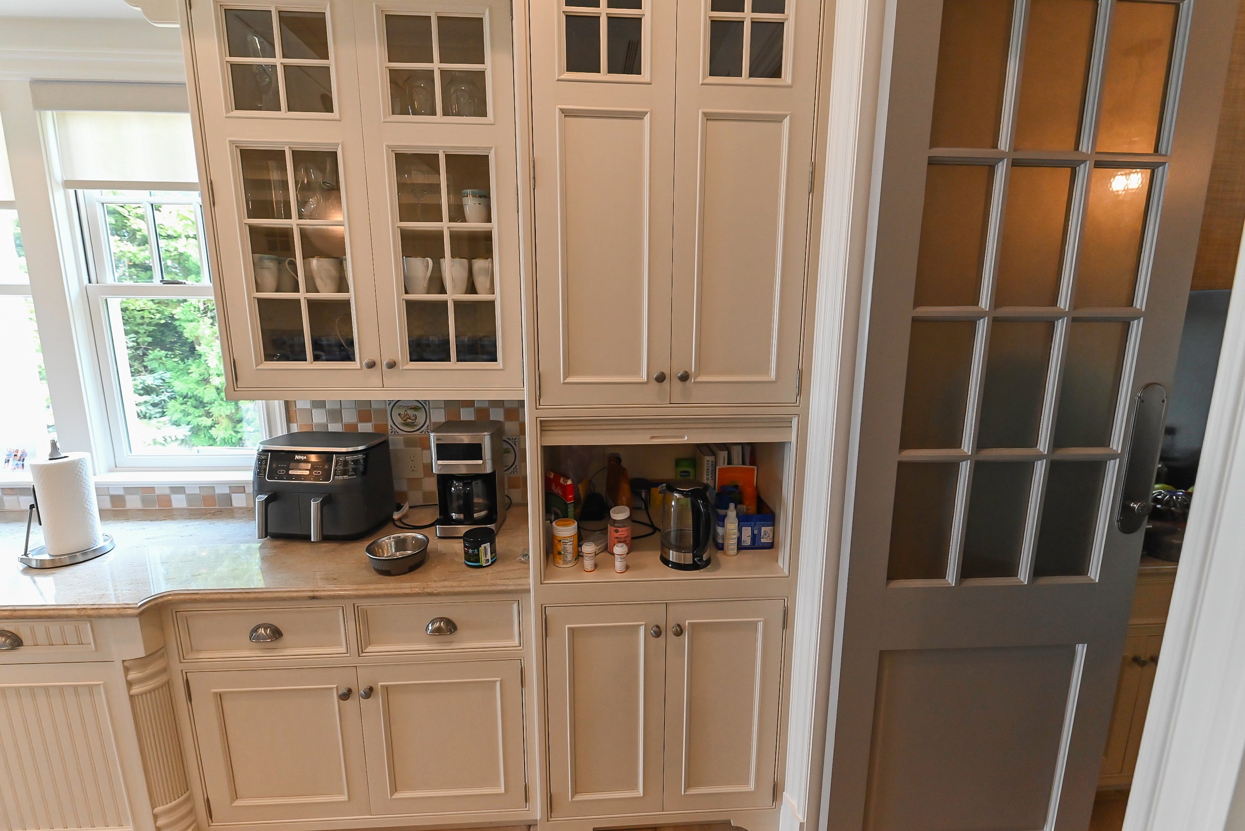 Craftmaid Traditional Off White Kitchen with Island, Granite Countertops & 48" Sub-Zero Refrigerator