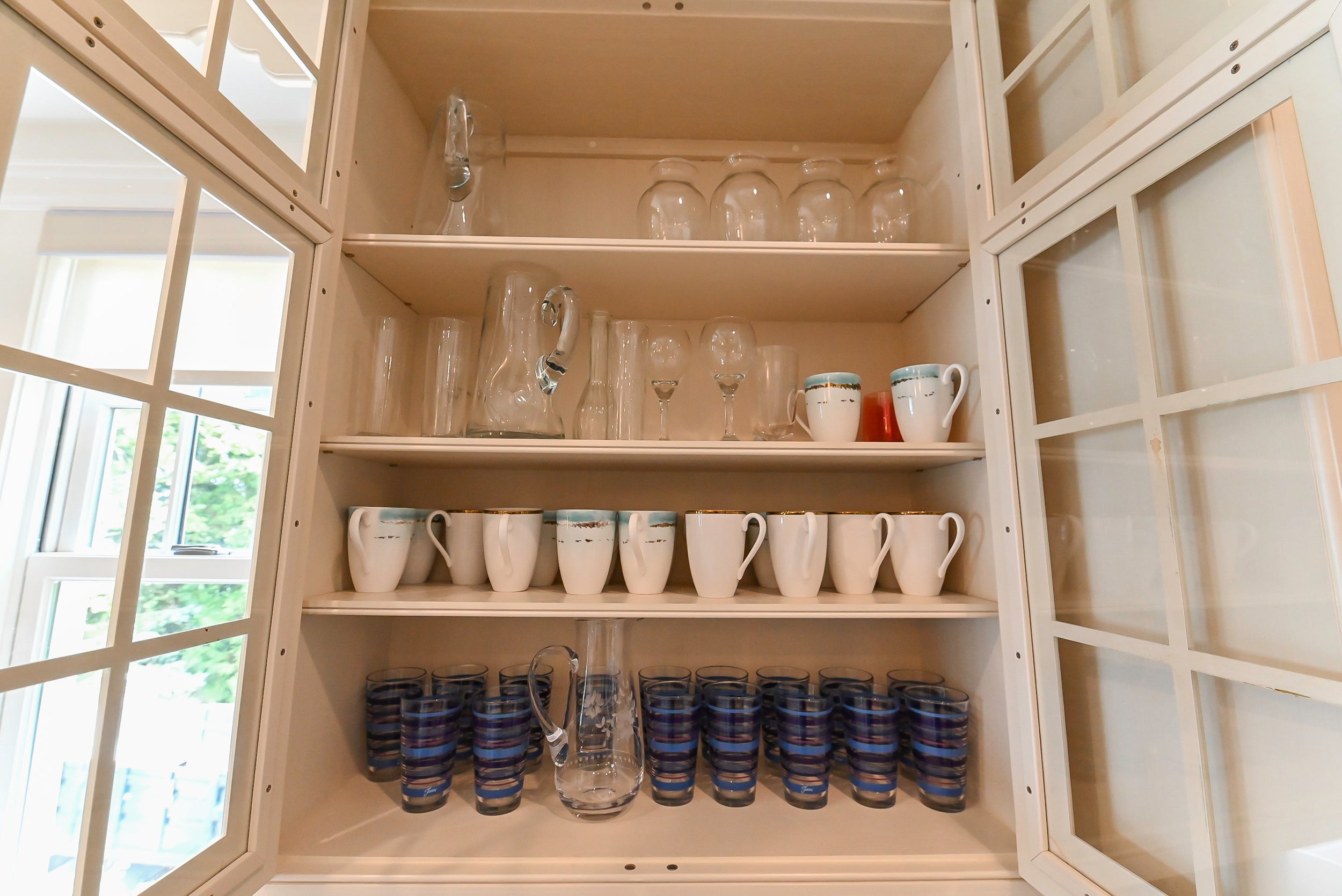 Craftmaid Traditional Off White Kitchen with Island, Granite Countertops & 48" Sub-Zero Refrigerator