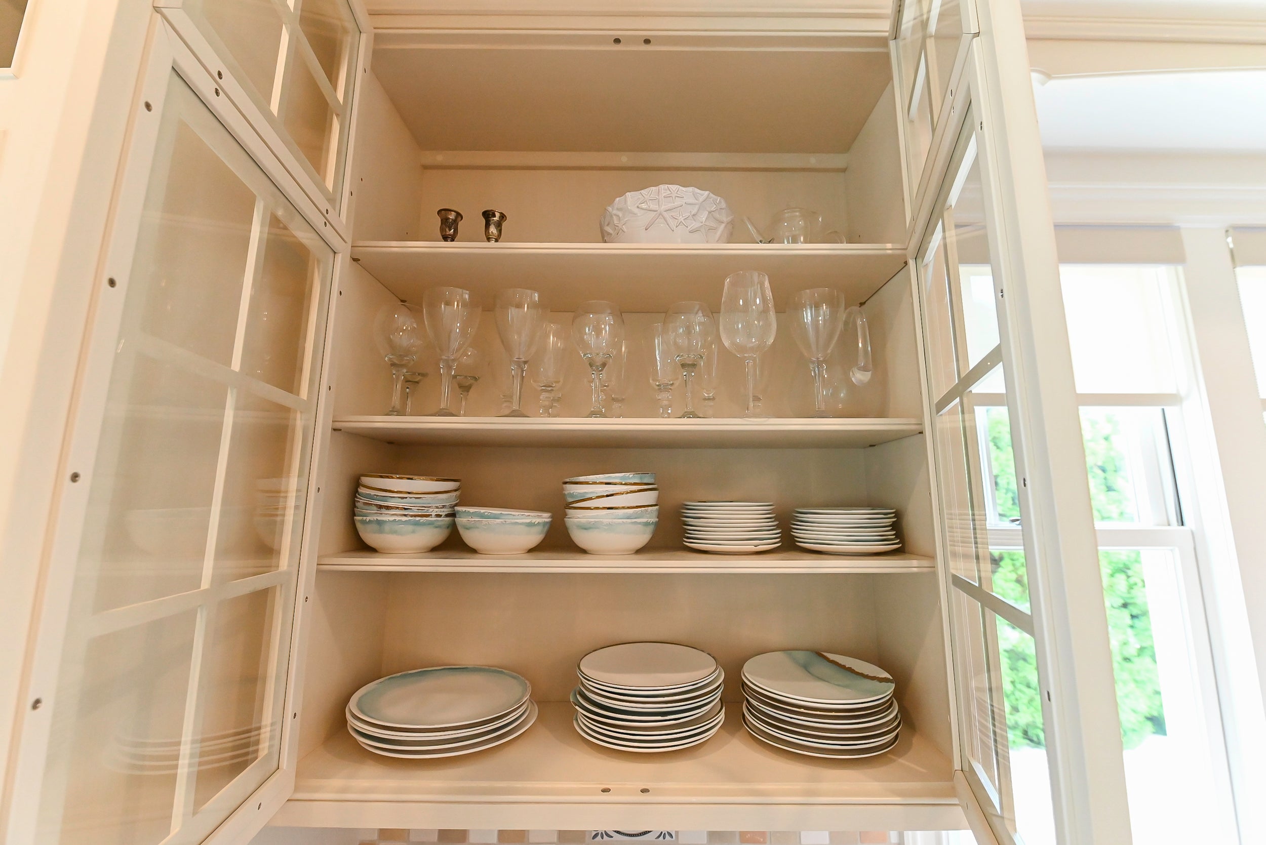 Craftmaid Traditional Off White Kitchen with Island, Granite Countertops & 48" Sub-Zero Refrigerator