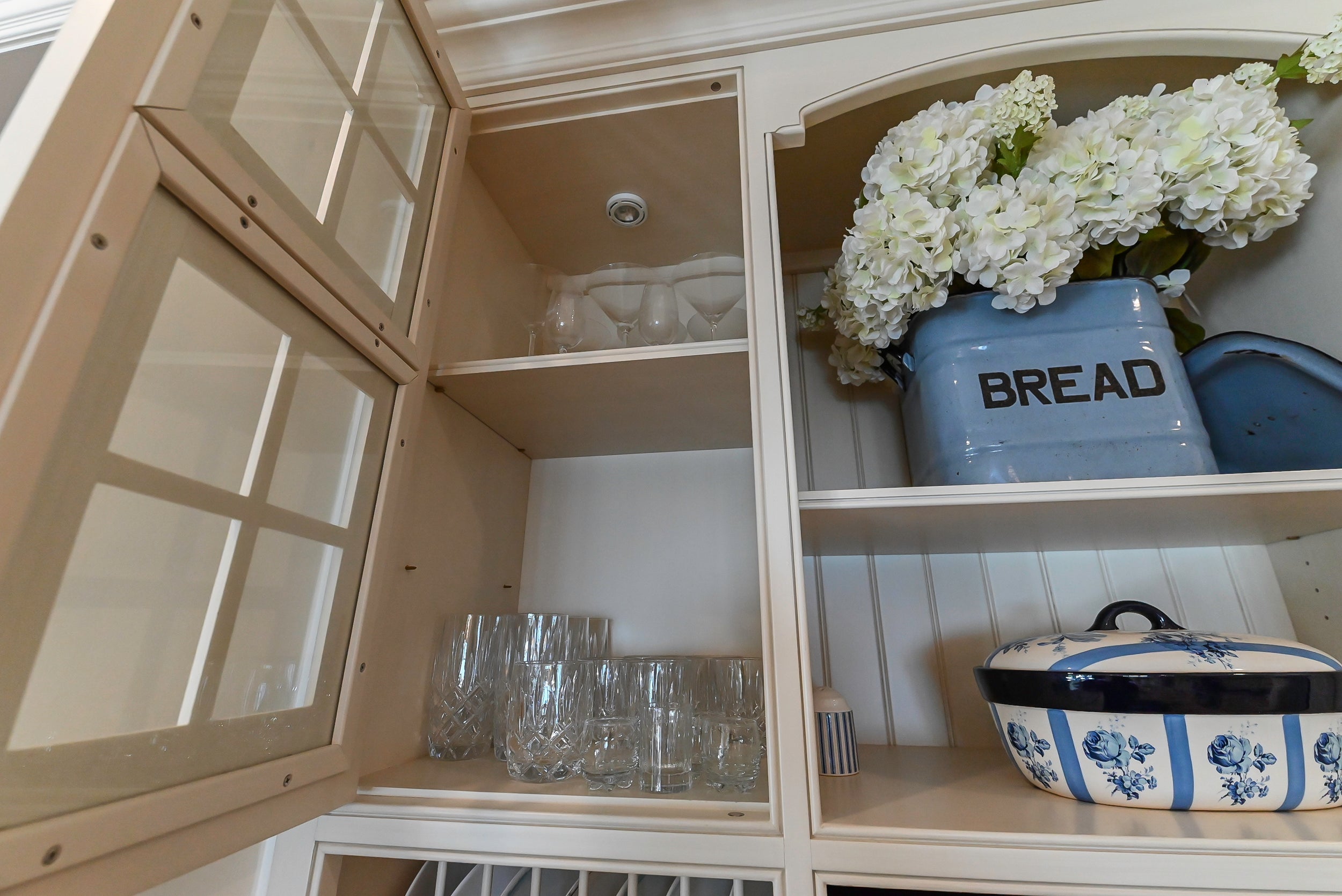 Craftmaid Traditional Off White Kitchen with Island, Granite Countertops & 48" Sub-Zero Refrigerator