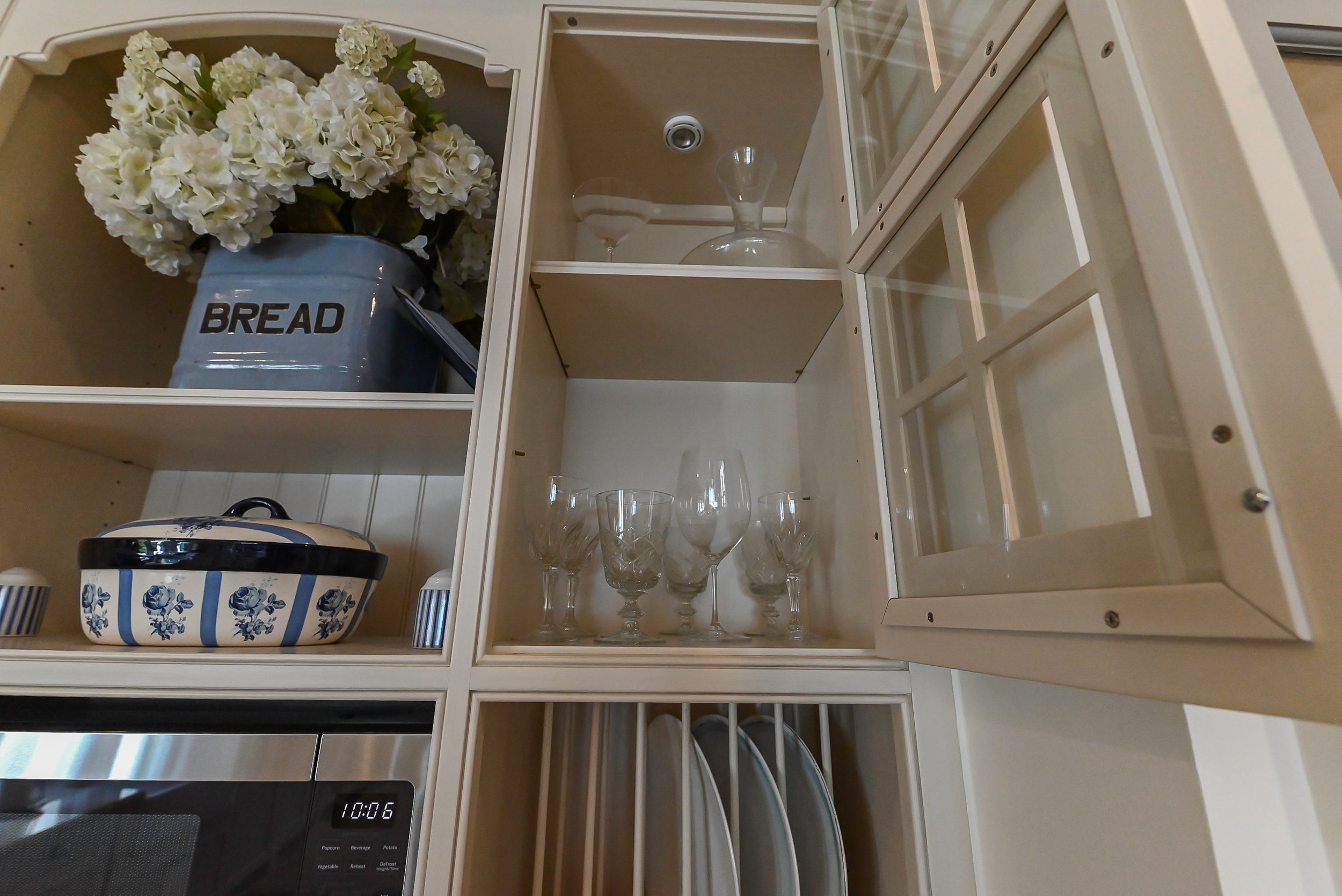 Craftmaid Traditional Off White Kitchen with Island, Granite Countertops & 48" Sub-Zero Refrigerator