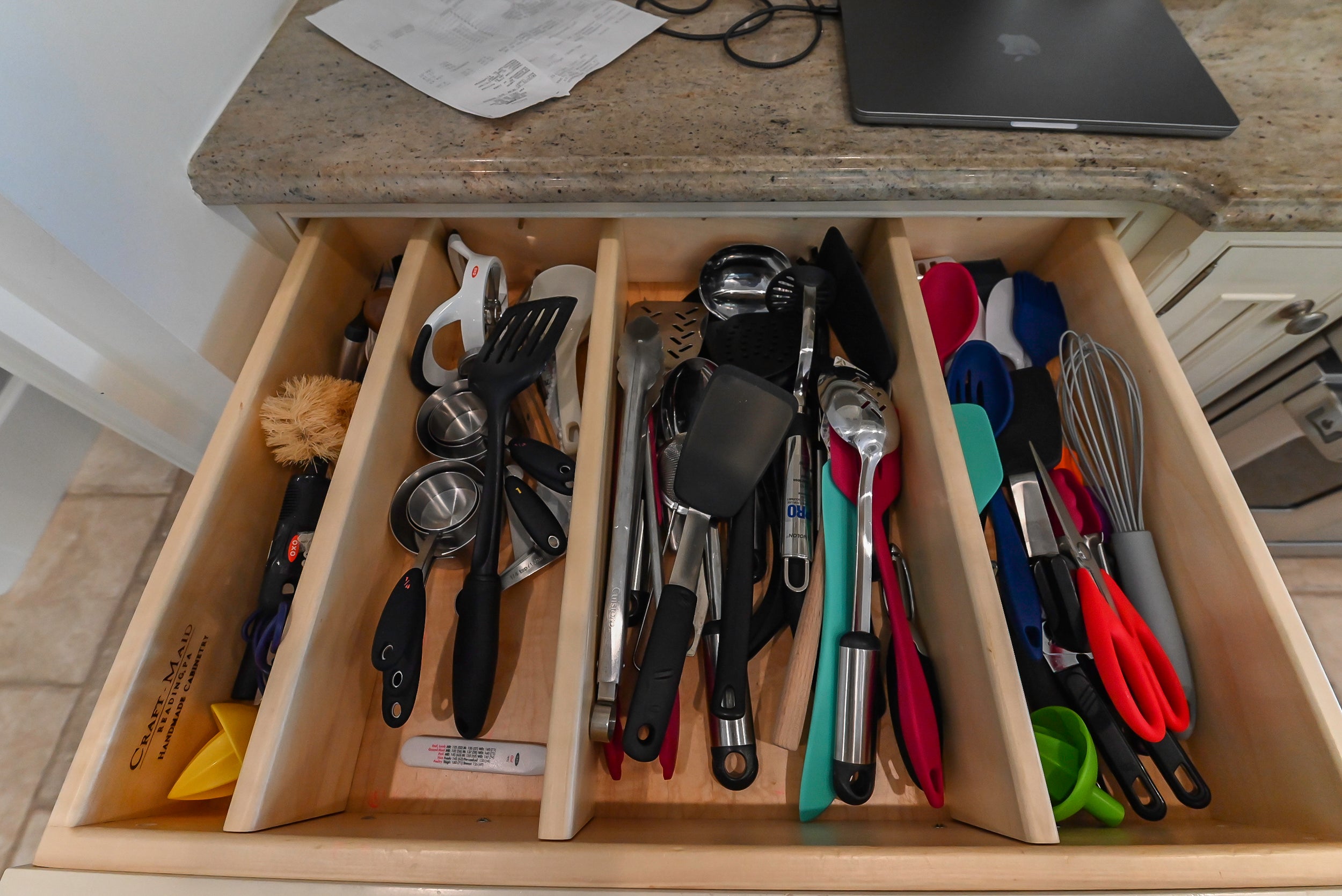 Craftmaid Traditional Off White Kitchen with Island, Granite Countertops & 48" Sub-Zero Refrigerator