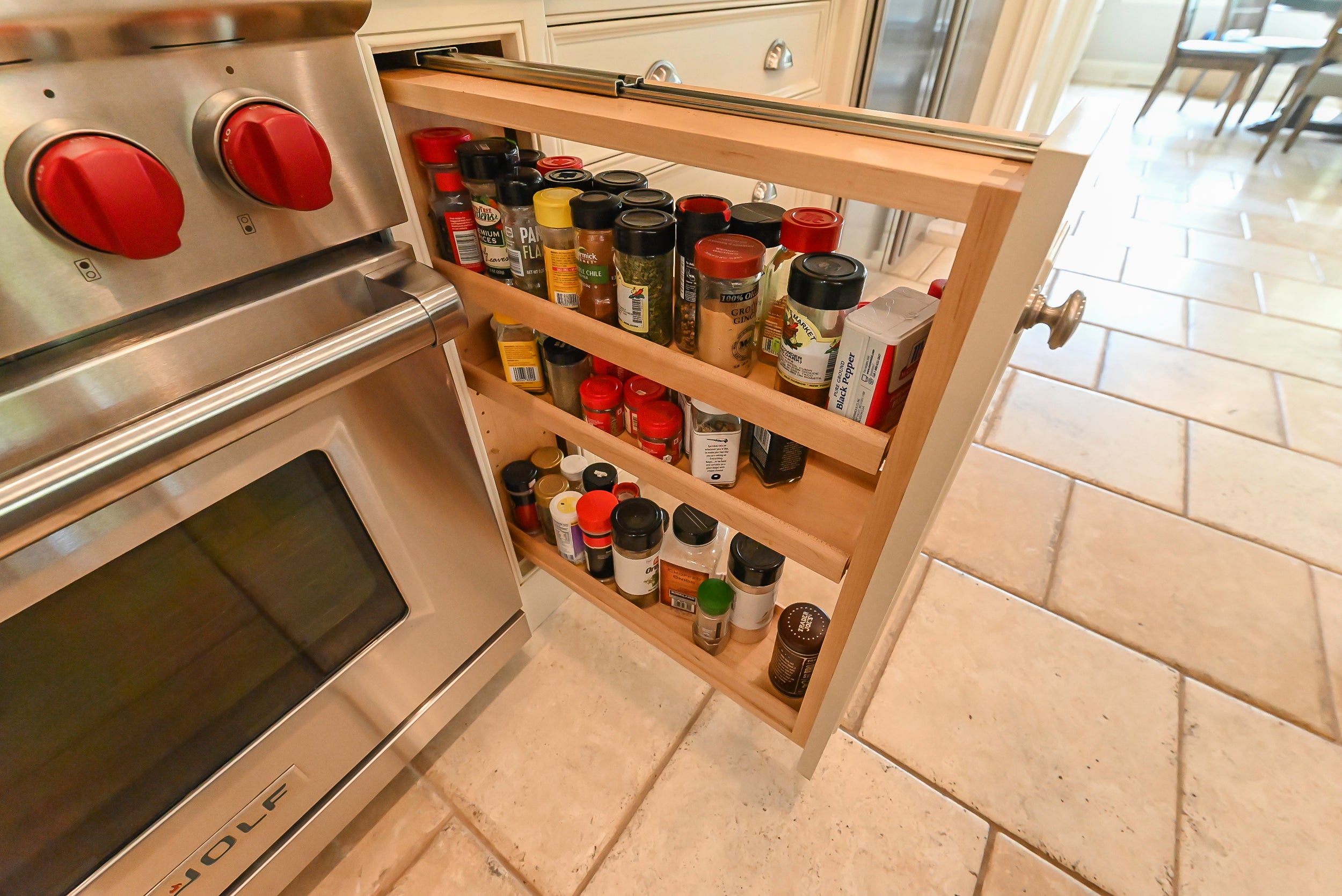 Craftmaid Traditional Off White Kitchen with Island, Granite Countertops & 48" Sub-Zero Refrigerator