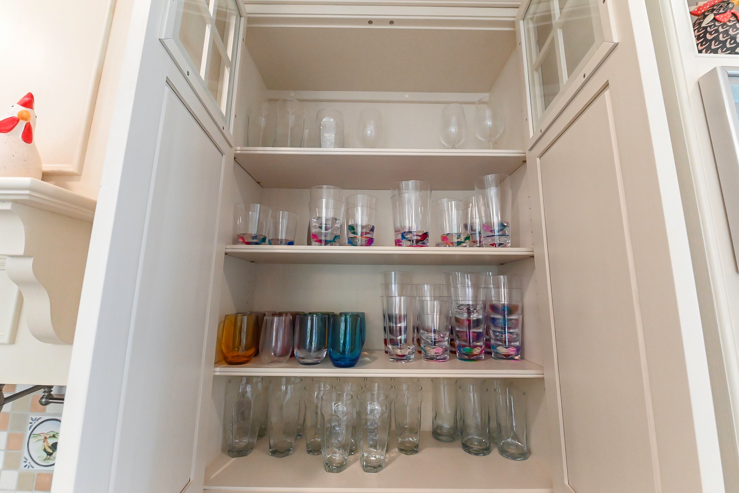 Craftmaid Traditional Off White Kitchen with Island, Granite Countertops & 48" Sub-Zero Refrigerator