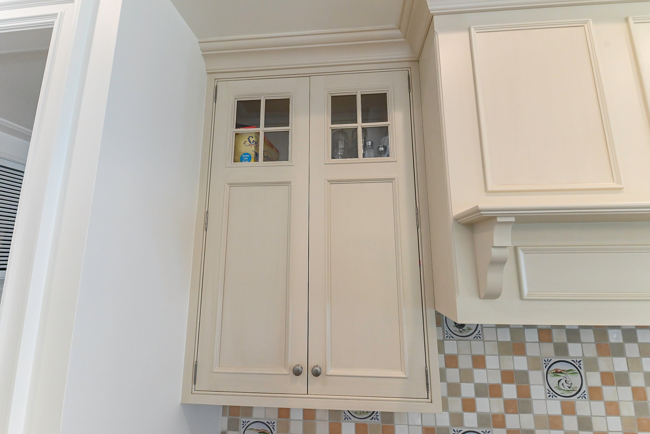 Craftmaid Traditional Off White Kitchen with Island, Granite Countertops & 48" Sub-Zero Refrigerator