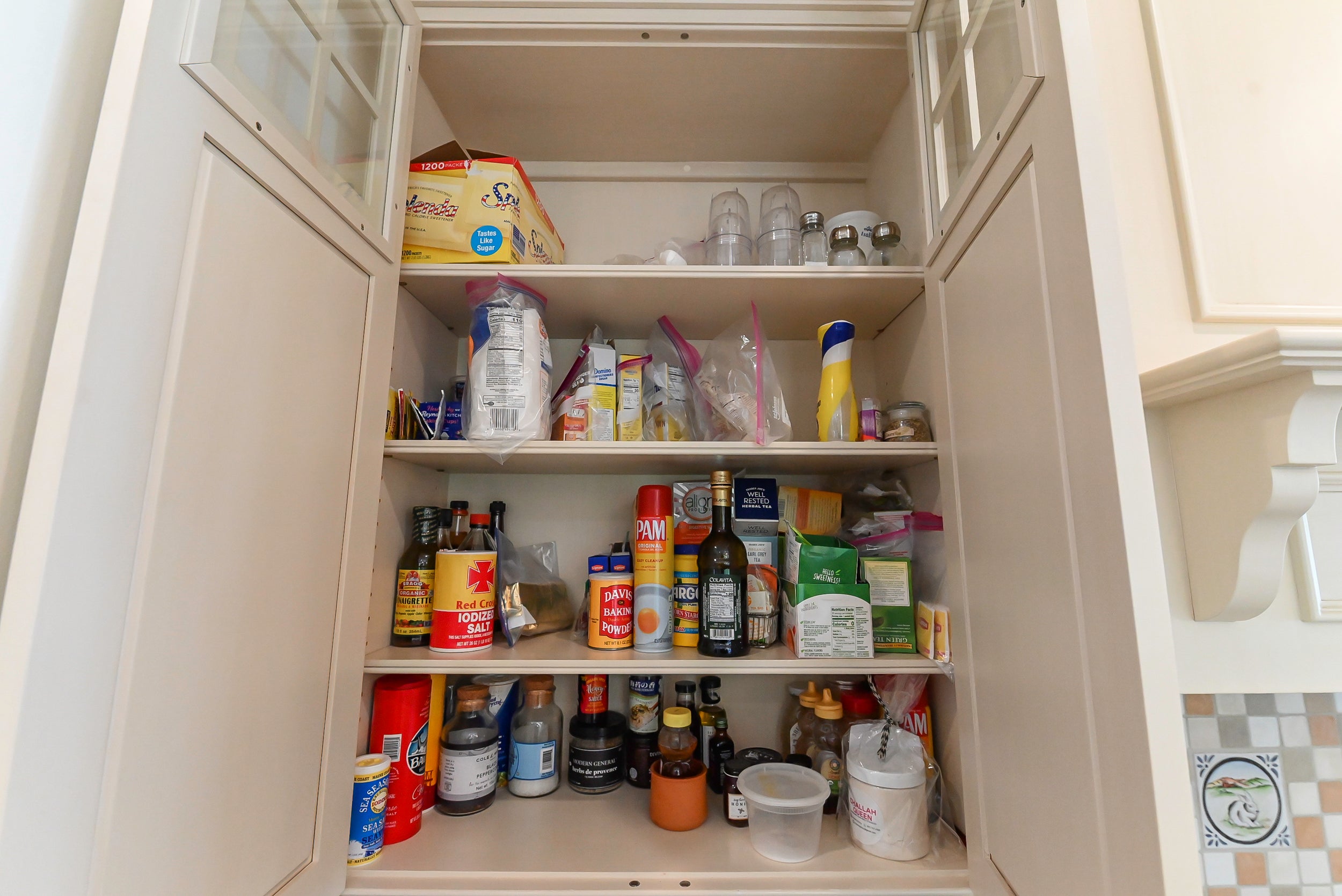 Craftmaid Traditional Off White Kitchen with Island, Granite Countertops & 48" Sub-Zero Refrigerator