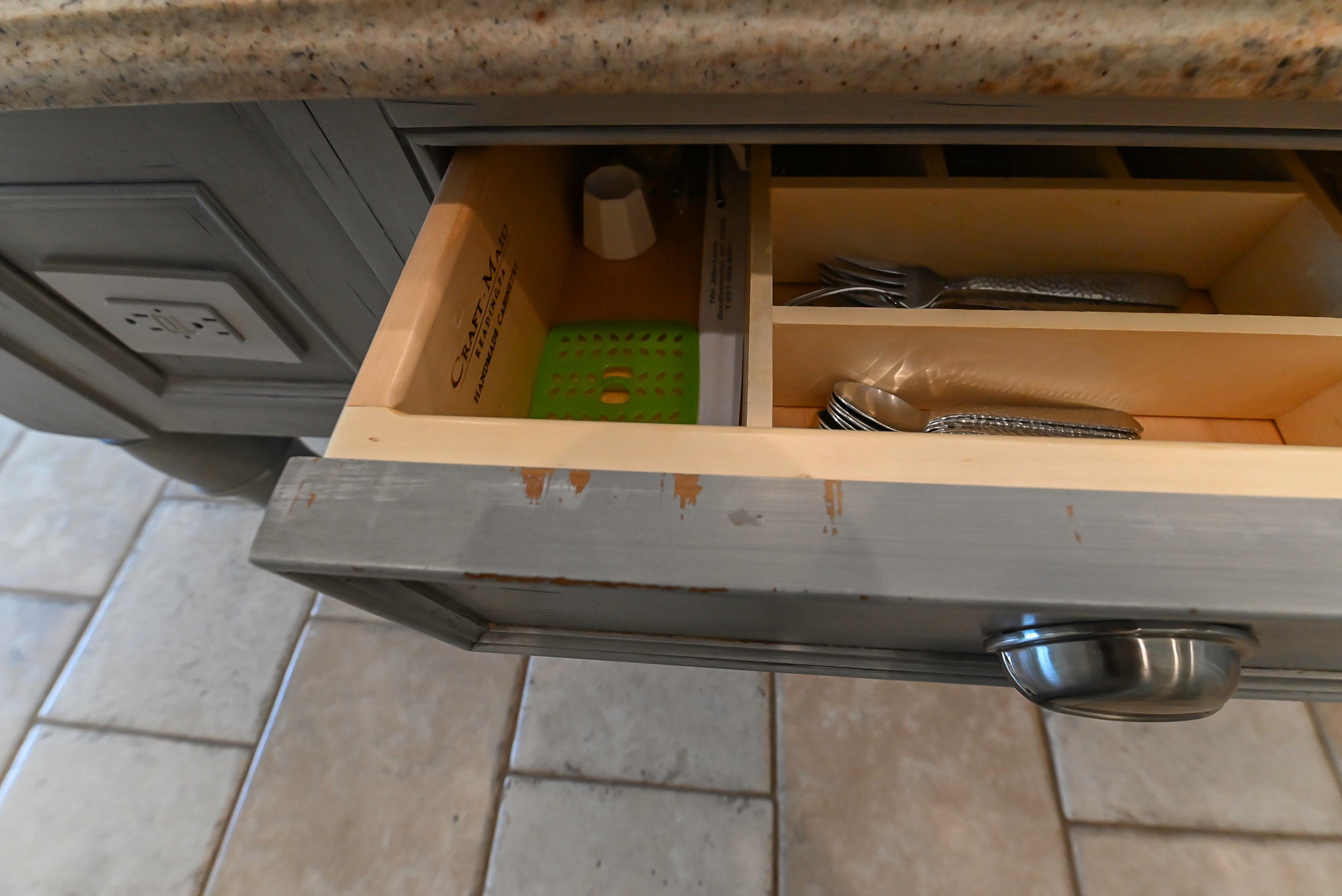 Craftmaid Traditional Off White Kitchen with Island, Granite Countertops & 48" Sub-Zero Refrigerator