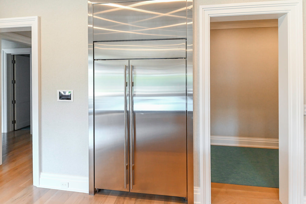Custom Transitional White Kitchen with Natural Wood Toned Island, Quartz and Granite Countertops, 60" Wolf Range and Appliances