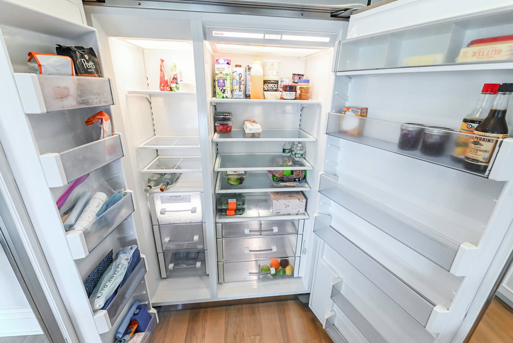 Custom Transitional White Kitchen with Natural Wood Toned Island, Quartz and Granite Countertops, 60" Wolf Range and Appliances