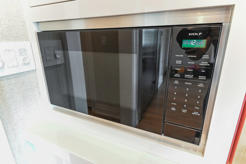 Custom Transitional White Kitchen with Natural Wood Toned Island, Quartz and Granite Countertops, 60" Wolf Range and Appliances