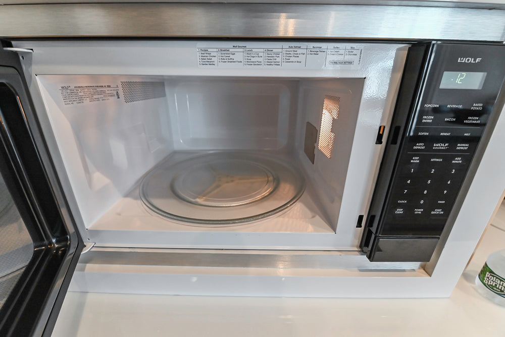Custom Transitional White Kitchen with Natural Wood Toned Island, Quartz and Granite Countertops, 60" Wolf Range and Appliances