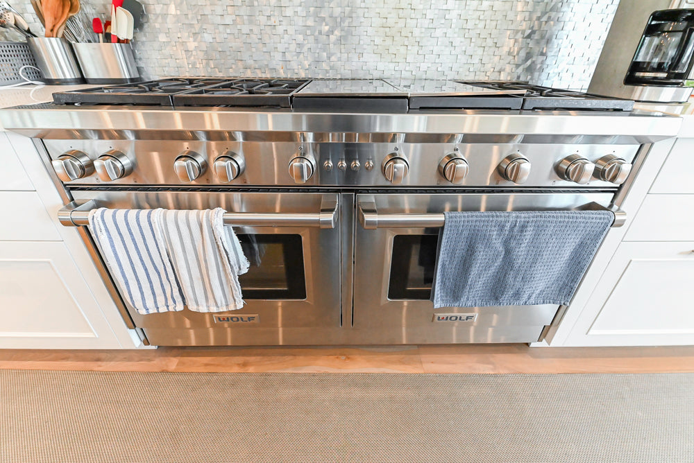 Custom Transitional White Kitchen with Natural Wood Toned Island, Quartz and Granite Countertops, 60" Wolf Range and Appliances