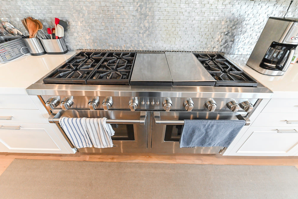 Custom Transitional White Kitchen with Natural Wood Toned Island, Quartz and Granite Countertops, 60" Wolf Range and Appliances