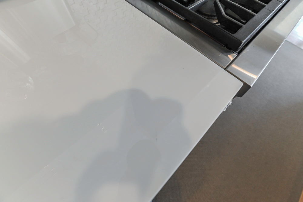 Custom Transitional White Kitchen with Natural Wood Toned Island, Quartz and Granite Countertops, 60" Wolf Range and Appliances