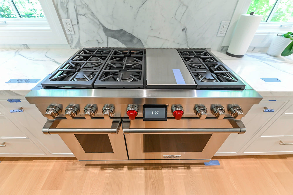 Custom Transitional White Kitchen with Natural Wood Toned Island, White Marble Countertops and 48" Wolf Range