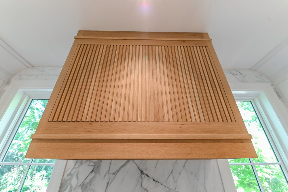 Custom Transitional White Kitchen with Natural Wood Toned Island, White Marble Countertops and 48" Wolf Range