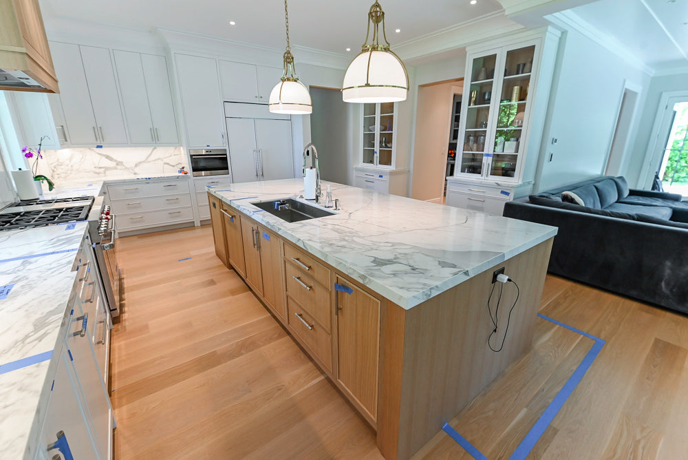 Custom Transitional White Kitchen with Natural Wood Toned Island, White Marble Countertops and 48" Wolf Range
