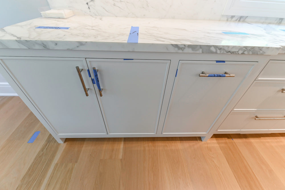 Custom Transitional White Kitchen with Natural Wood Toned Island, White Marble Countertops and 48" Wolf Range