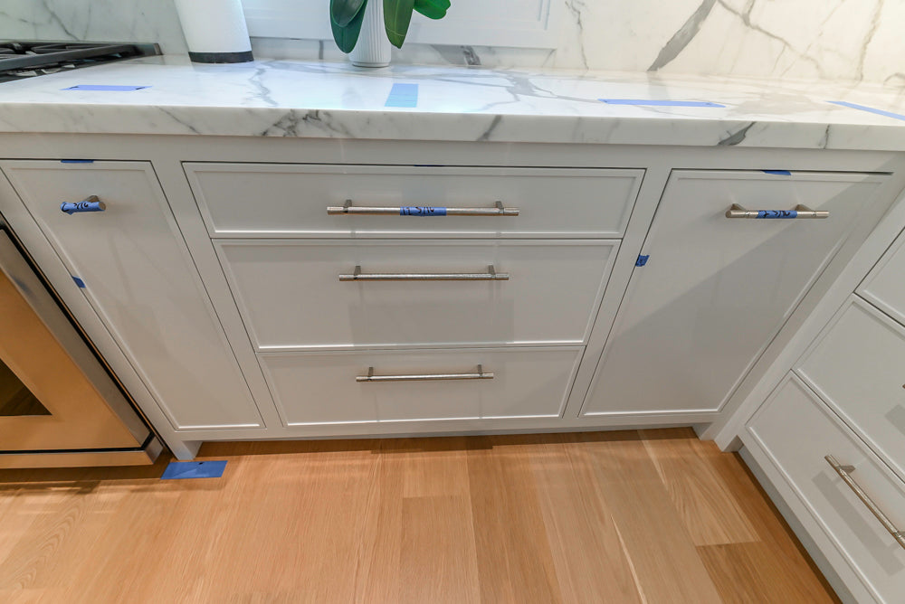 Custom Transitional White Kitchen with Natural Wood Toned Island, White Marble Countertops and 48" Wolf Range