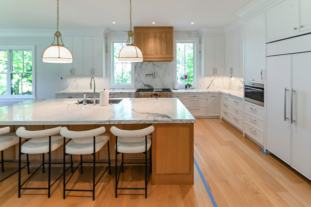 Custom Transitional White Kitchen with Natural Wood Toned Island, White Marble Countertops and 48" Wolf Range