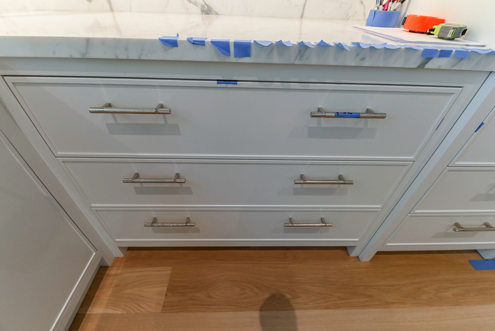 Custom Transitional White Kitchen with Natural Wood Toned Island, White Marble Countertops and 48" Wolf Range