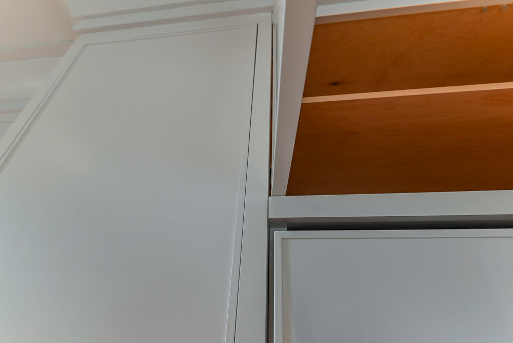 Custom Transitional White Kitchen with Natural Wood Toned Island, White Marble Countertops and 48" Wolf Range