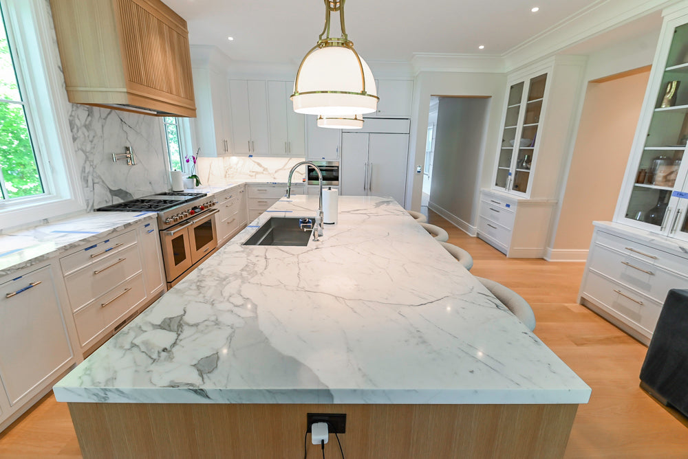 Custom Transitional White Kitchen with Natural Wood Toned Island, White Marble Countertops and 48" Wolf Range