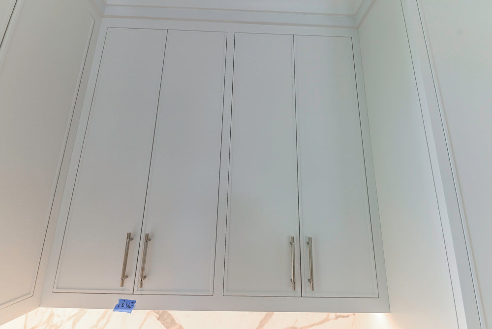 Custom Transitional White Kitchen with Natural Wood Toned Island, White Marble Countertops and 48" Wolf Range