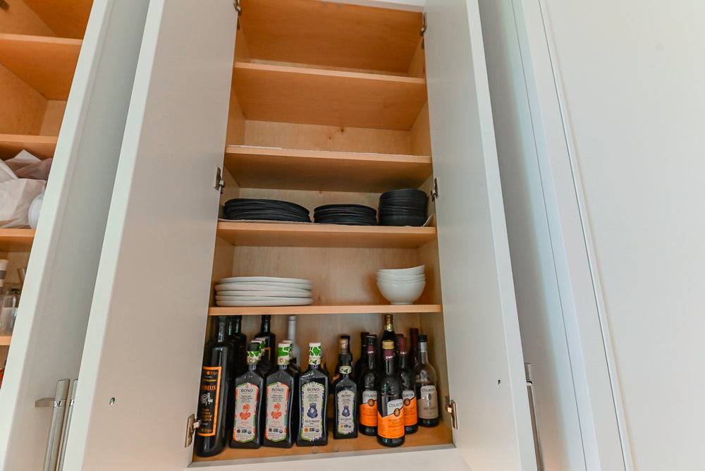 Custom Transitional White Kitchen with Natural Wood Toned Island, White Marble Countertops and 48" Wolf Range