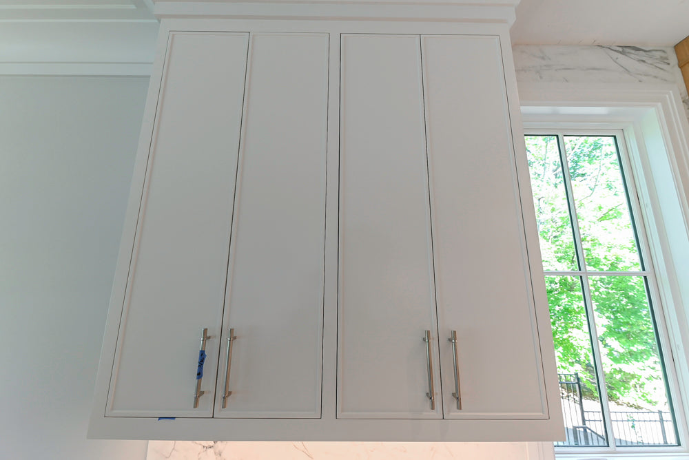 Custom Transitional White Kitchen with Natural Wood Toned Island, White Marble Countertops and 48" Wolf Range