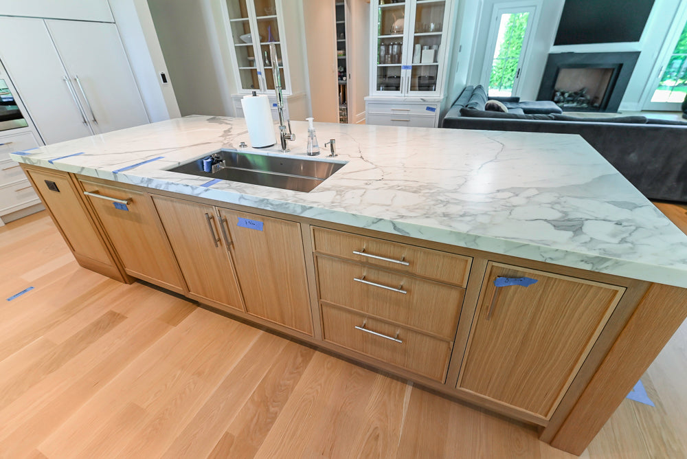 Custom Transitional White Kitchen with Natural Wood Toned Island, White Marble Countertops and 48" Wolf Range