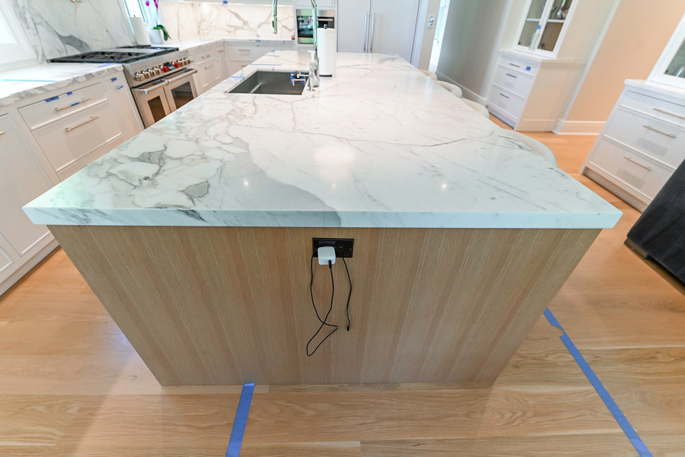 Custom Transitional White Kitchen with Natural Wood Toned Island, White Marble Countertops and 48" Wolf Range