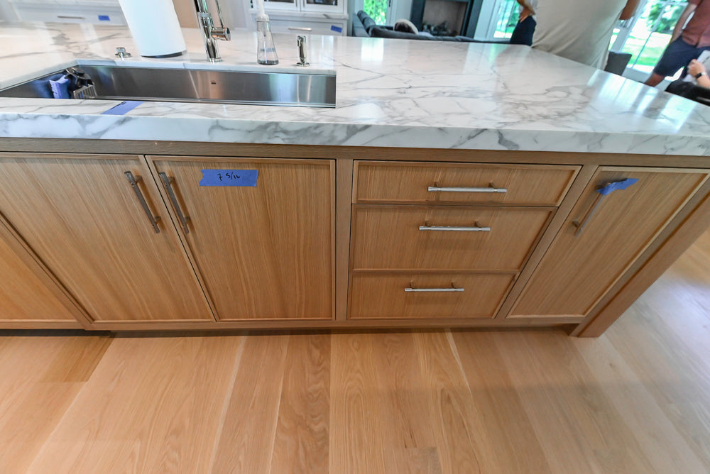 Custom Transitional White Kitchen with Natural Wood Toned Island, White Marble Countertops and 48" Wolf Range