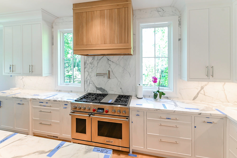 Custom Transitional White Kitchen with Natural Wood Toned Island, White Marble Countertops and 48" Wolf Range