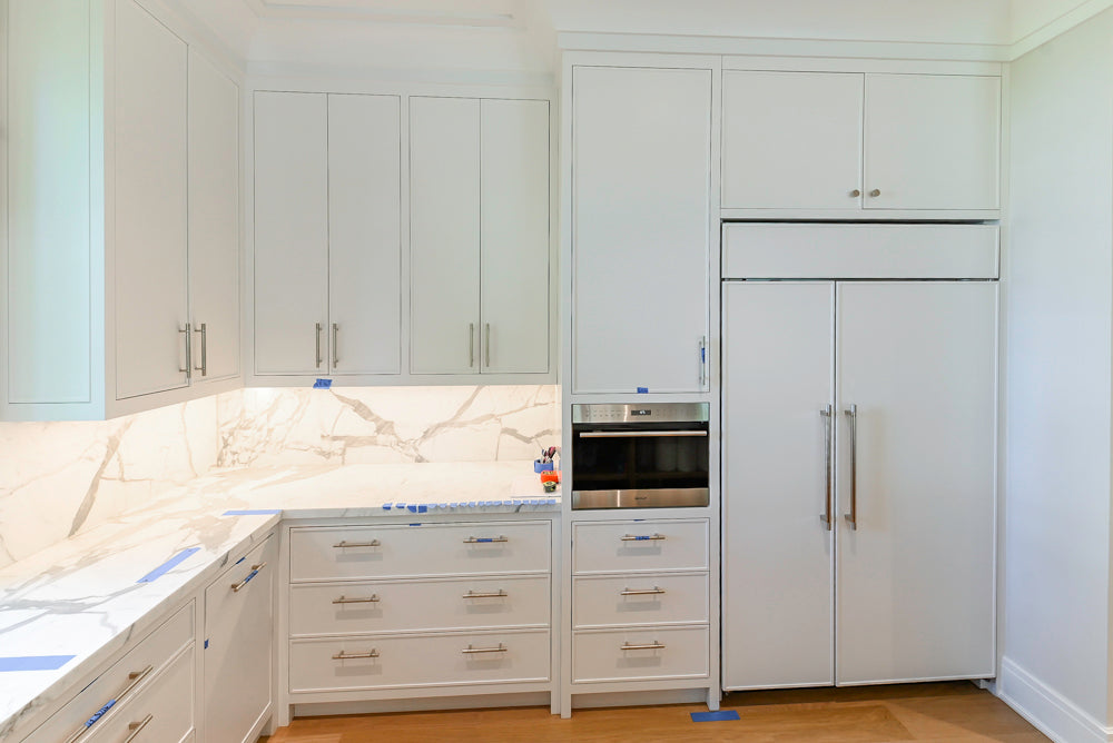 Custom Transitional White Kitchen with Natural Wood Toned Island, White Marble Countertops and 48" Wolf Range