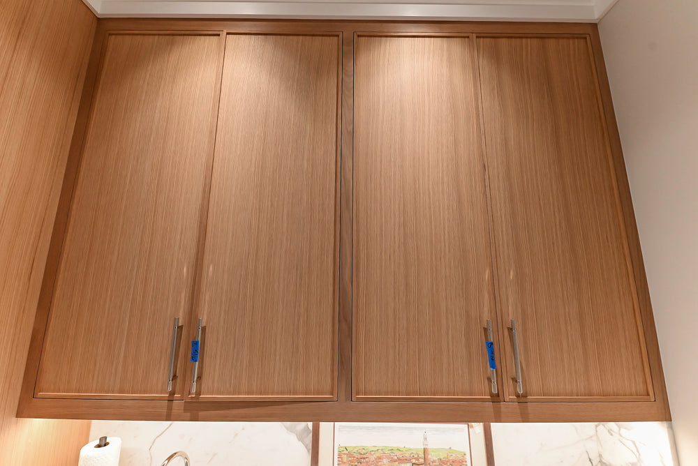 Custom Transitional Natural Wood Toned Butler's Pantry with Marble Countertops