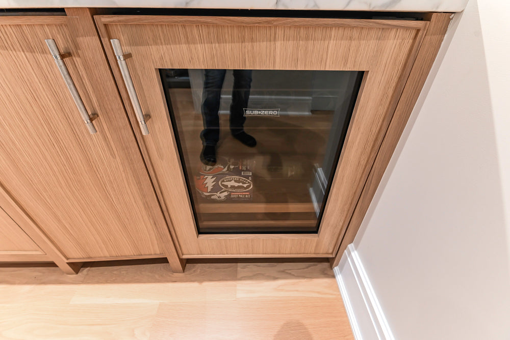 Custom Transitional Natural Wood Toned Butler's Pantry with Marble Countertops