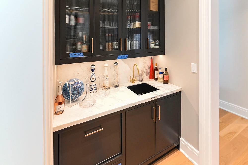 Custom Transitional Black Wet Bar with White Marble Countertops