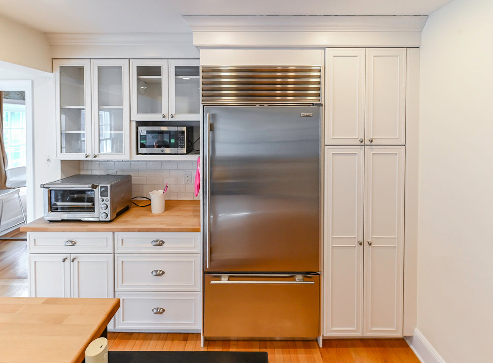 Omega Traditional White Kitchen with Island, Butcher Block Counters and Appliances