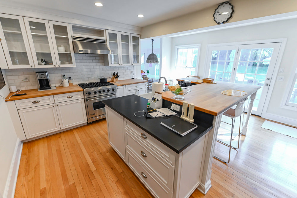 Omega Traditional White Kitchen with Island, Butcher Block Counters and Appliances