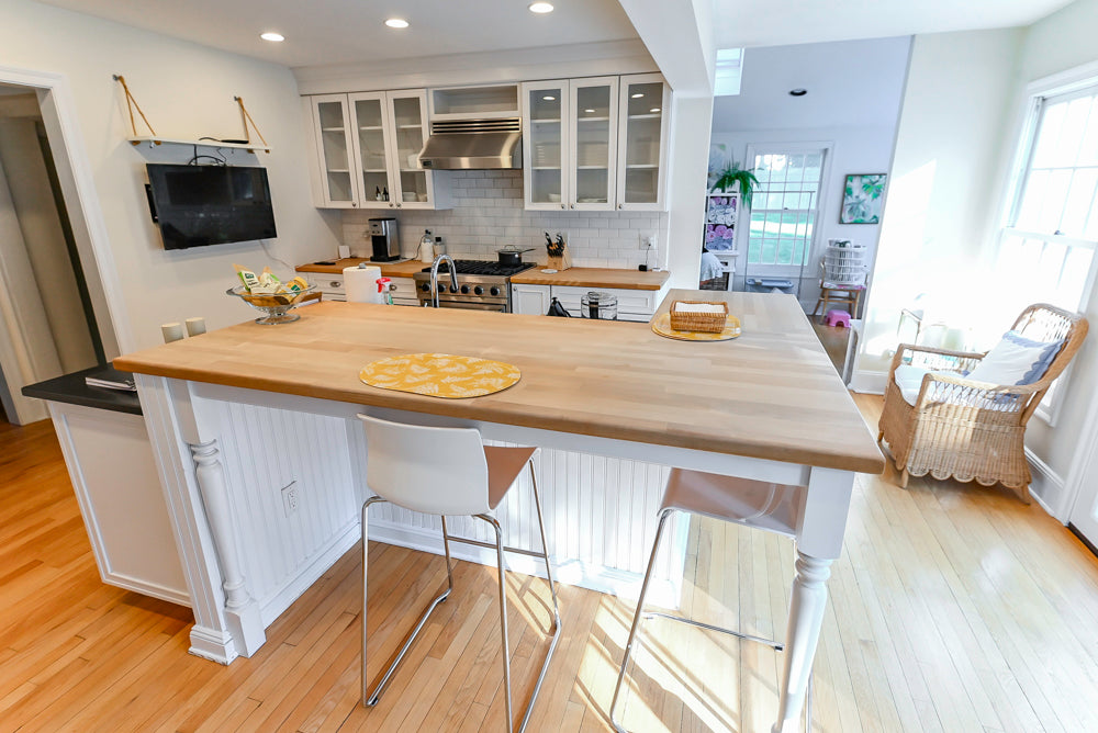 Omega Traditional White Kitchen with Island, Butcher Block Counters and Appliances