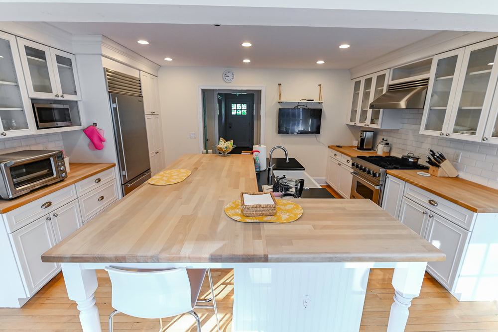 Omega Traditional White Kitchen with Island, Butcher Block Counters and Appliances