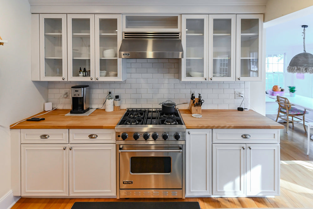 Omega Traditional White Kitchen with Island, Butcher Block Counters and Appliances