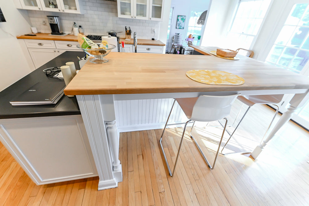 Omega Traditional White Kitchen with Island, Butcher Block Counters and Appliances