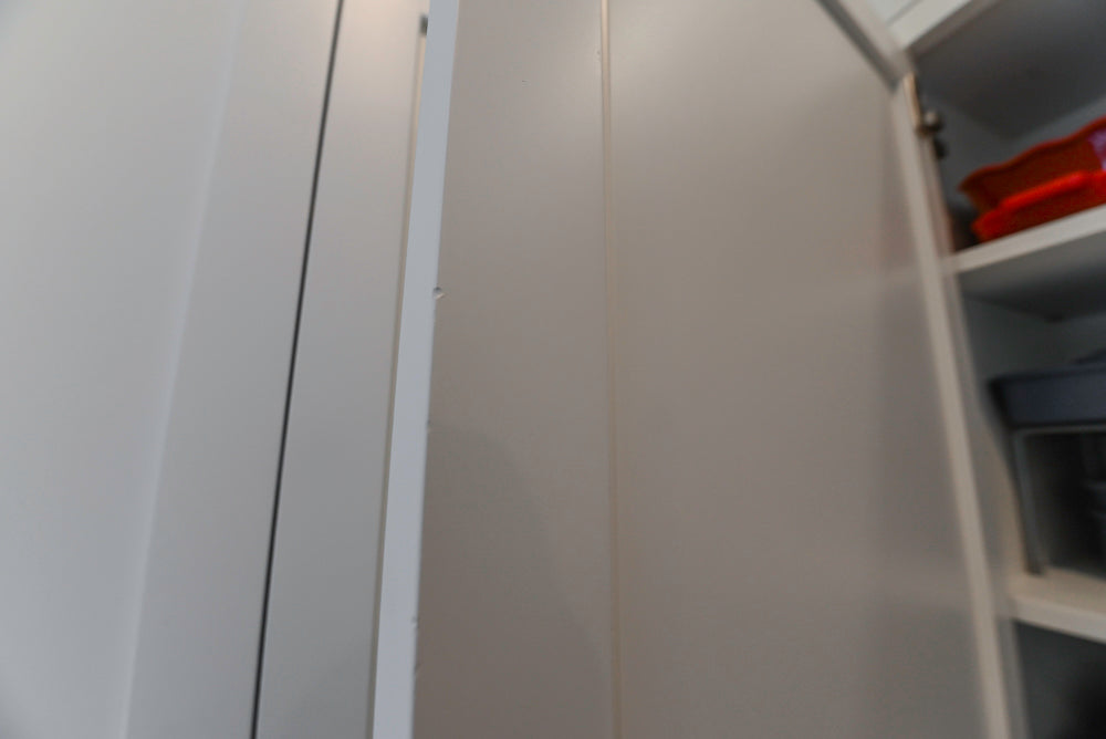 "The Belmont" Transitional White Kitchen with Island, Marble Countertop and Sub-Zero & Wolf Appliances