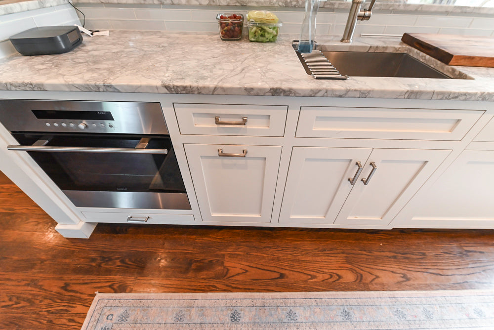 "The Belmont" Transitional White Kitchen with Island, Marble Countertop and Sub-Zero & Wolf Appliances